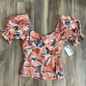 Nine West pink and blue twist front top
